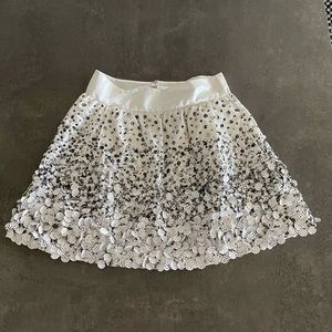 Manish Arora sequenced black and white mini skirt.